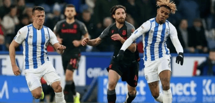 B体育体育官网app-哈德斯菲尔德客场逼平，表现稳定